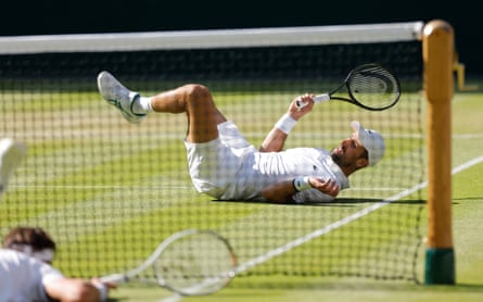 Novak Djokovic ends up on his back in his match with Arthur Rinderknech, who also finishes on the grass of Centre Court.