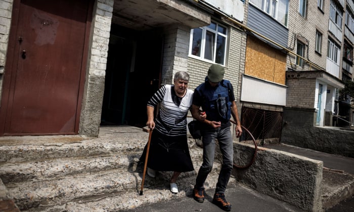 Nina Stepanova is evacuated by volunteers of the NGO “Vostok SOS”, as Russia’s attack on Ukraine continues, in BakhmutNina Stepanova, 72, is evacuated by volunteers of the NGO “Vostok SOS”, as Russia’s attack on Ukraine continues, in Bakhmut, Ukraine, August 5, 2022. REUTERS/Alkis Konstantinidis