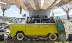 A VW campervan has been converted into a bar at Tinos Surf Lessons in the Cyclades. Greece.