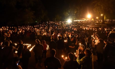Hundreds of people gather for a vigil in Roseburg, Oregon on October 1, 2015, for ten people killed and seven others wounded in a shooting at a community college in the western US state of Oregon. 