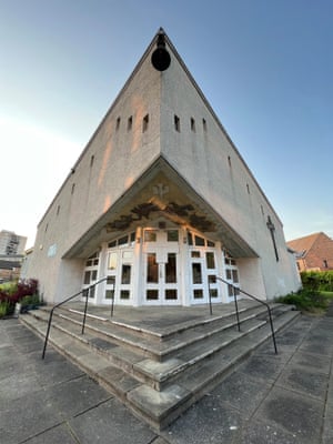 A sloping triangular modernist church building