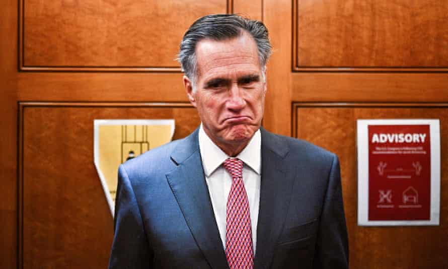 An image of Mitt Romney looking downcast.