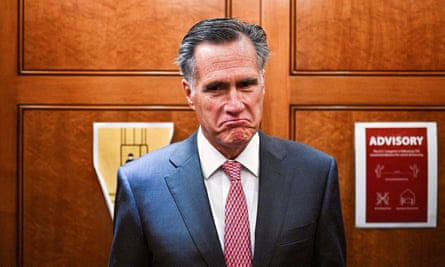Mitt Romney frowns at the camera