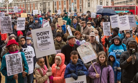 demonstrators march through Brixton in London to protest against Lambeth council’s library closure plans in March 2016.