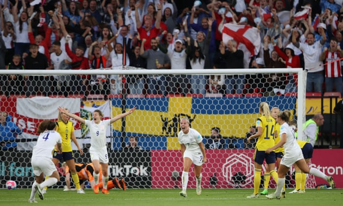 Beth Meade of England celebrates scoring her first goal.