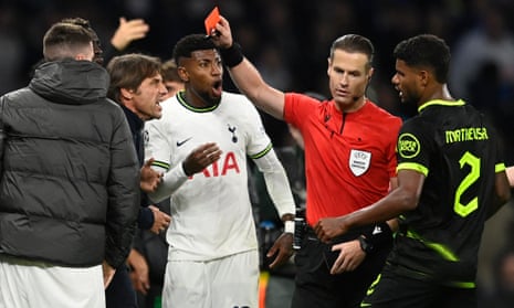 Tottenham Hotspur manager Antonio Conte is shown a red card by referee Danny Makkelie.