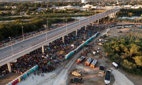 Migrants shelter near Del Rio International Bridge in Del Rio, Texas<br>Migrants shelter along the Del Rio International Bridge after crossing the Rio Grande river into the U.S. from Ciudad Acuna in Del Rio, Texas, U.S. September 19, 2021. Picture taken with a drone. REUTERS/Adrees Latif