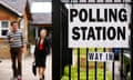 People arrive to cast their votes at a polling station in Tower Hamlets, East London in 2010