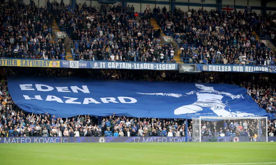 Chelsea fans unfurl a giant Eden Hazard banner at Stamford Bridge in 2019.
