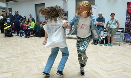 Two girls dance at Belfast TradFest. 