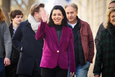 Sophia Chikirou waves while on the campaign trail.