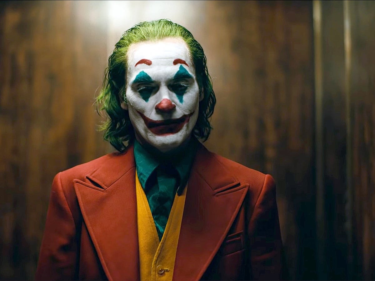 Joker review – Joaquin Phoenix's villain has last laugh in twisted ...