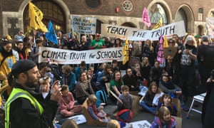 Teachers and students protest against the UK government's stance on climate change education