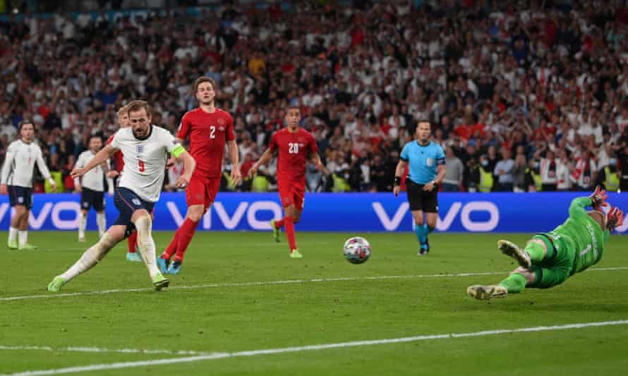 Harry Kane scores from the rebound for the winner in extra time after seeing his penalty saved by Kasper Schmeichel.