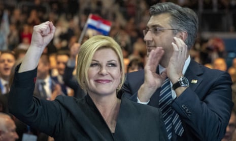 Kolinda Grabar-Kitarović, left, and Andrej Plenković greet supporters at a rally in Zagreb on Thursday before Croatians go to the polls this weekend.