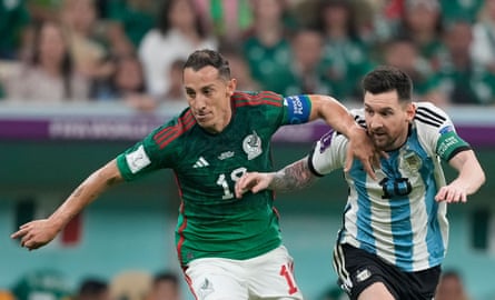 Andrés Guardado and Lionel Messi in action at Qatar 2022.
