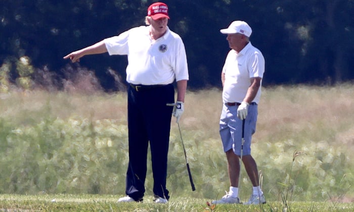 “Look over there”. Donald Trump (left) and Lindsey Graham play golf at the Trump National Golf Club in Sterling, Virginia, USA, 18 July 2020.