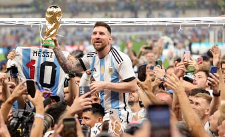 Lionel Messi (C) of Argentina lifts the World Cup trophy after winning the FIFA World Cup 2022 Final between Argentina and France at Lusail stadium, Lusail, Qatar, 18 December 2022.