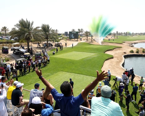 Spectators react ahead of tee off on the first tee at the LIV Golf Invitational in Jeddah, October 2022