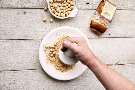 ‘Grind the hazelnuts in a pestle and mortar or a food processor until fine, with a little bite remaining.’