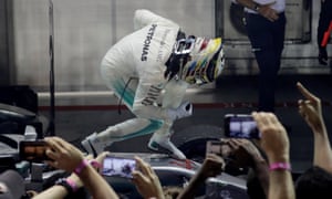 Lewis Hamilton celebrates winning the race.