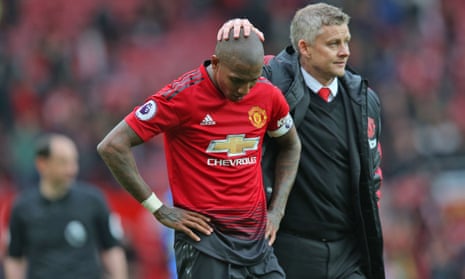 Ole Gunnar Solskjær comforts Ashley Young after Manchester United were unable to defeat Chelsea at Old Trafford.