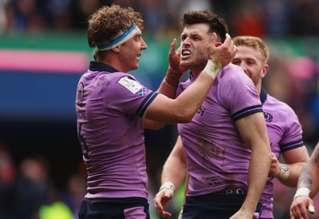 Scotland's Blair Kinghorn (right) celebrates his fourth try with Jamie Ritchie.
