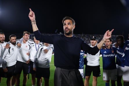 Como manager Cesc Fàbregas gives a post-game, on-pitch team talk to his players after opening the Italian side’s Champions League campaign with a win.