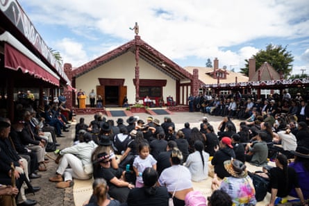 Māori tribes gather in front of the Māhinārangi (meeting house) at Tūrangawaewae Marae.