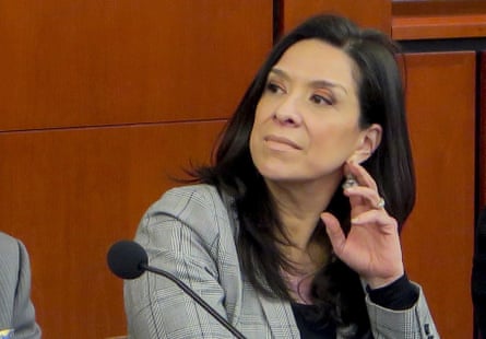 Woman in court looks to side
