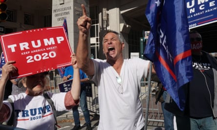 Trump supporters outside the Pennsylvania convention center, where ballots were being counted, 6 November 2020.