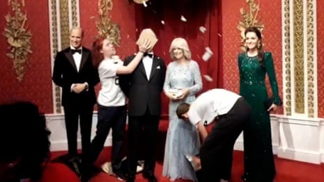 Just Stop Oil protesters smear King Charles waxwork with cake – video