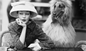 Model Dovima wearing Balenciaga at Les Deux Magots café in Paris, 1955