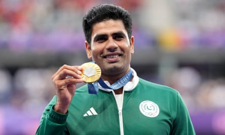 Nadeem holds his gold medal