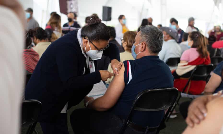 A vaccination centre in Chalco. Mexico has administered roughly 28m doses of the vaccine but many doctors and health workers have been denied.