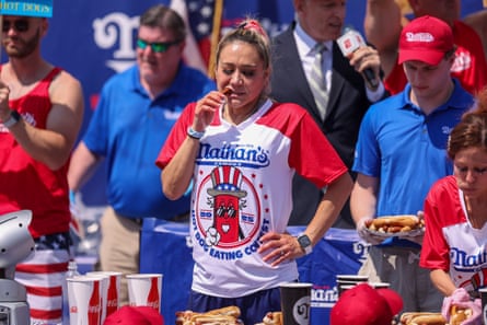 The women’s winner, reigning champion Miki Sudo, managed 33 hotdogs for her title.