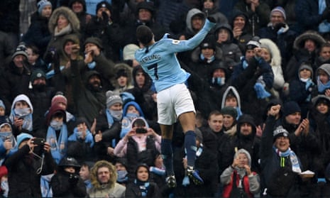 Raheem Sterling celebrates after restoring Manchester City’s two-goal cushion.