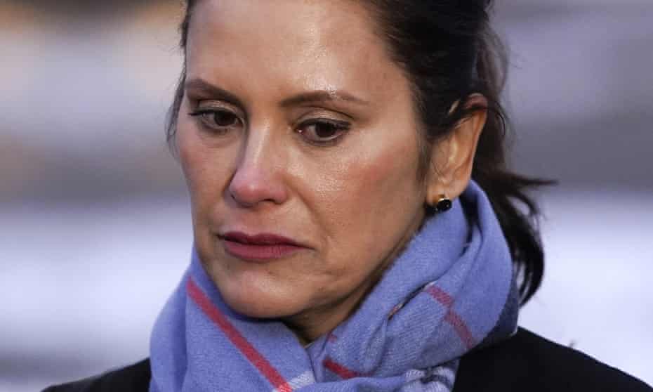 Gretchen Whitmer listens during a news conference in Oxford, Michigan.