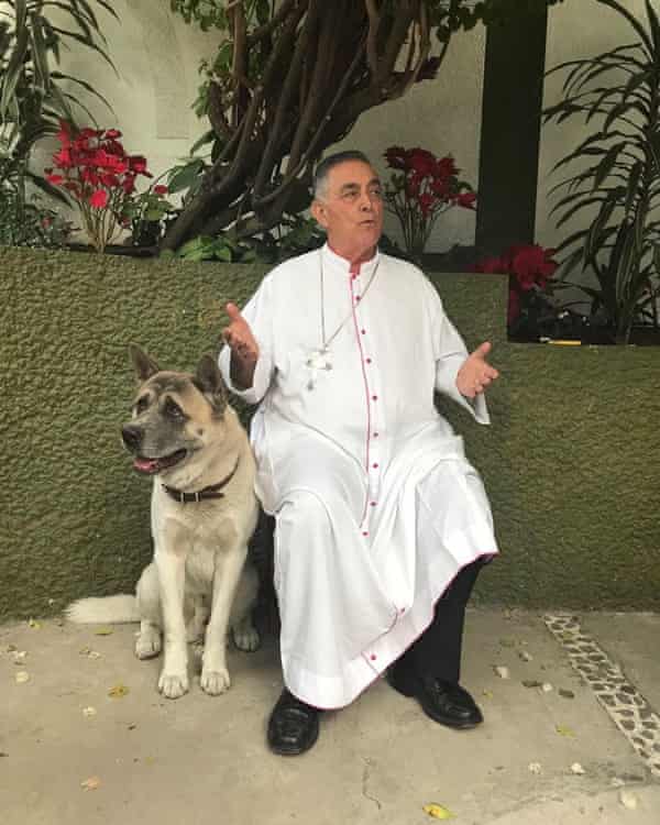 Bishop Salvador Rangel Mendoza and his dog, Taro.