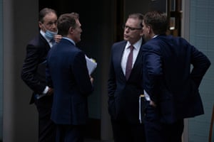The chair of the Joint Committee on Intelligence and Security Andrew Hastie and the deputy chair Anthony Byrne talk to the Leader of the House Christian Porter and Health minister Greg Hunt after question time