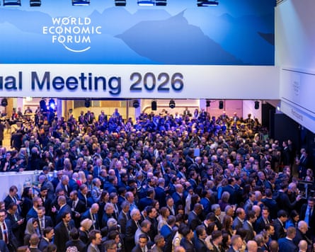 WEF delegates queue to enter the congress hall to hear Donald Trump’s speech