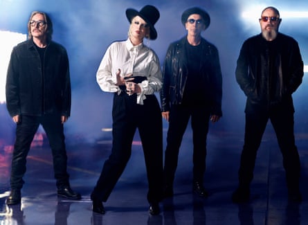 Manson with her bandmates.