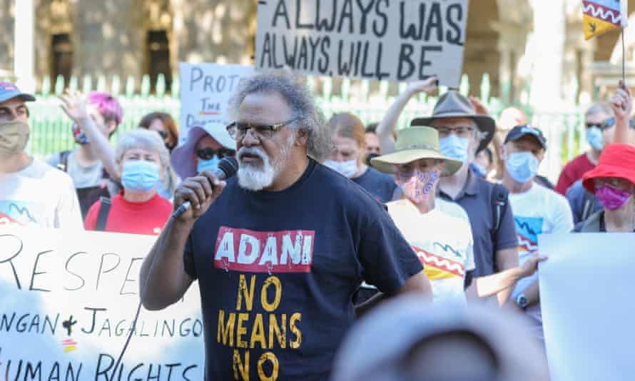 Wangan and Jagalingou's traditional owner, Adrian Burragubba, speaks at a rally at the Queensland parliament in August