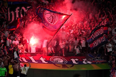 Crystal Palace fans celebrate after Jean-Philippe Mateta scores their side's first goal during the Europa Conference League final.