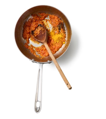 Felicity Cloake’s rasam 02d. Heat a half-tablespoon of your chosen fat in a saucepan, add the ginger, garlic and tomatoes, and cook until the tomatoes dry out and audibly begin to fry.