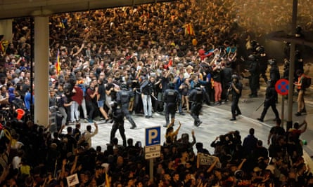 Protesters clash with police outside El Prat airport