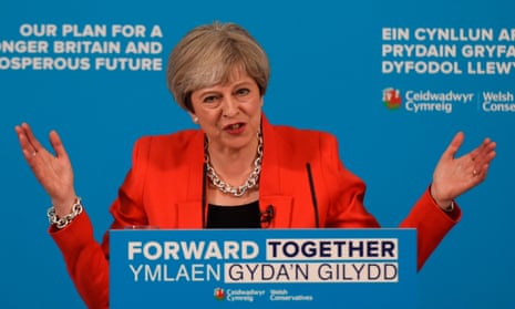 Theresa May gestures while defending her social care policy during the 2017 election campaign in Wales.