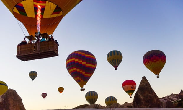 Hot air balloons glide over Cappadocia in Turkey 