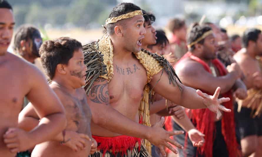 The Waka land on the beach and a haka is performed in 2021 in Waitangi, New Zealand.