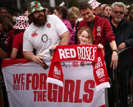 Fans wait for the England players to arrive at the Red Roses Champions Party.